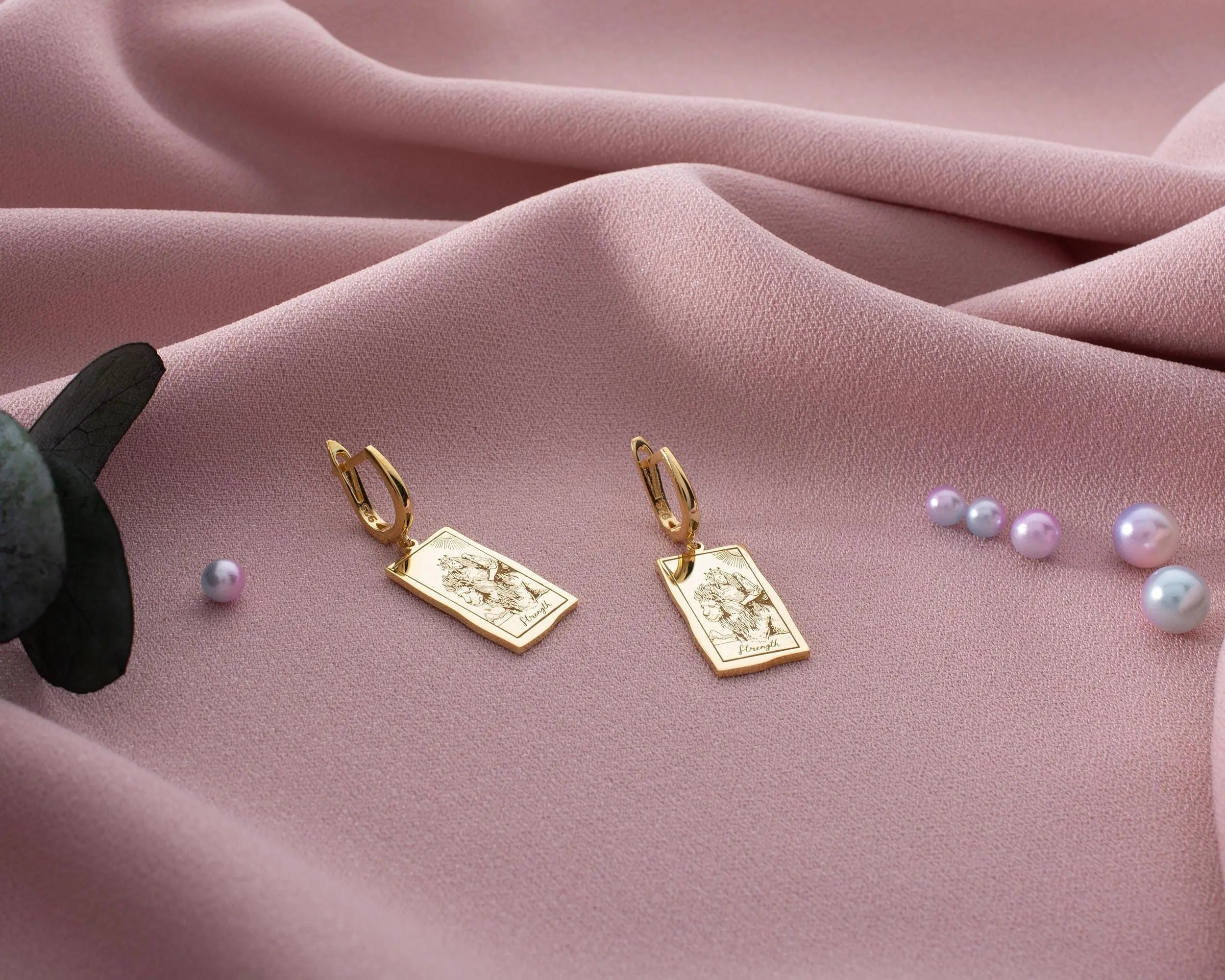 Elegant gold earrings for women styled with minimalist everyday jewelry and timeless fashion outfits