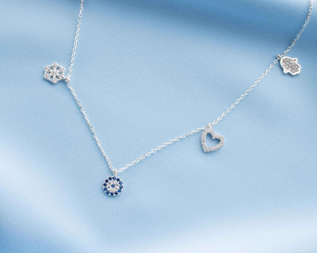 Sterling Silver Charm Anklet: Evil Eye, Heart, Snowflake