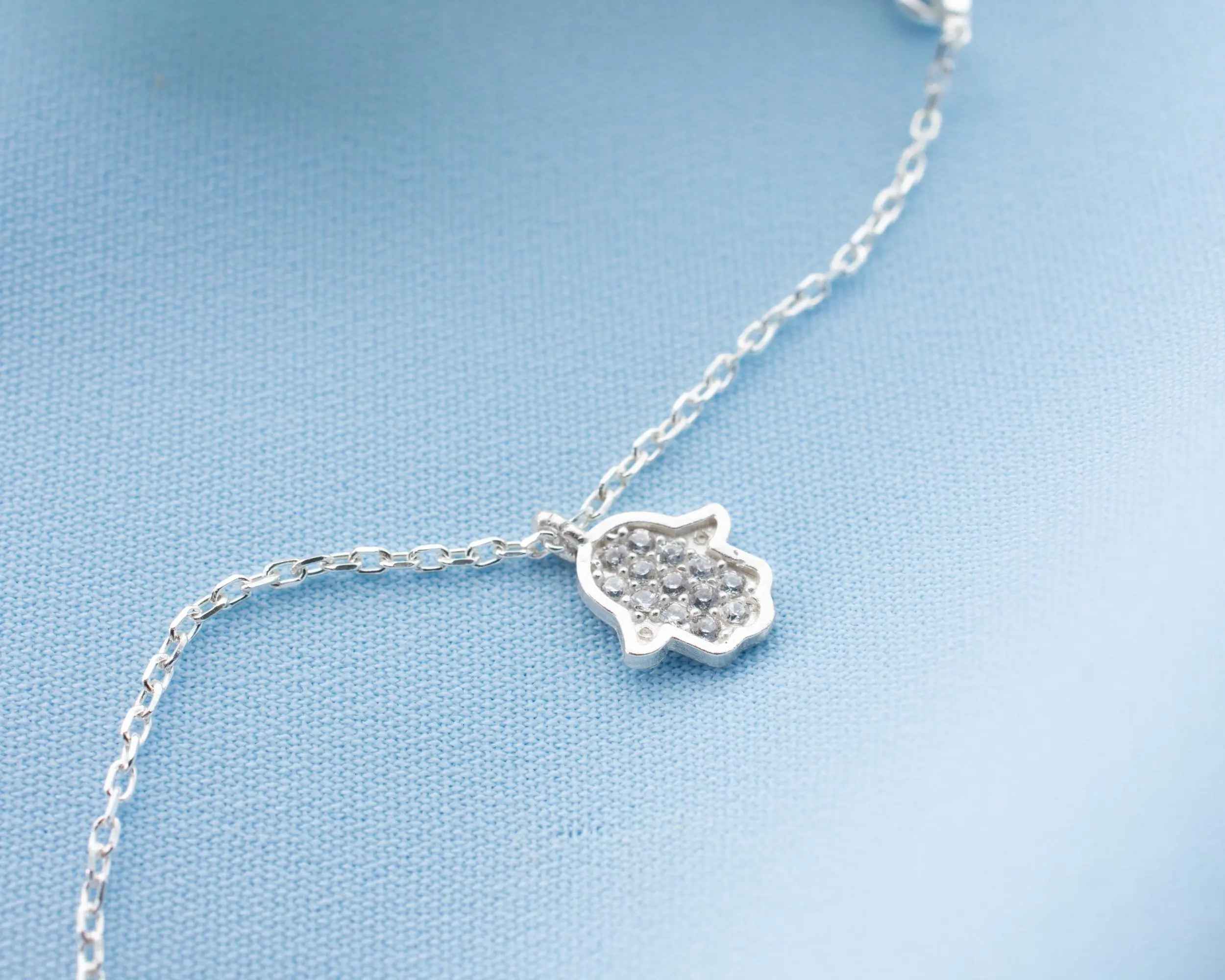 Sterling Silver Charm Anklet: Evil Eye, Heart, Snowflake