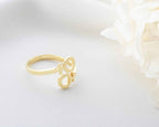 Solid Gold Double Venus Ring: Lesbian Pride Jewelry