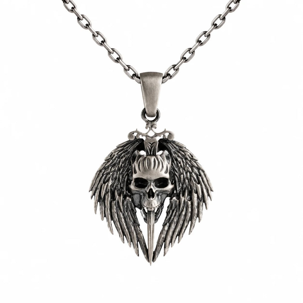 A silver-toned metal pendant necklace featuring a winged skull design with a dagger through the center, suspended from a matching chain against a plain white background.