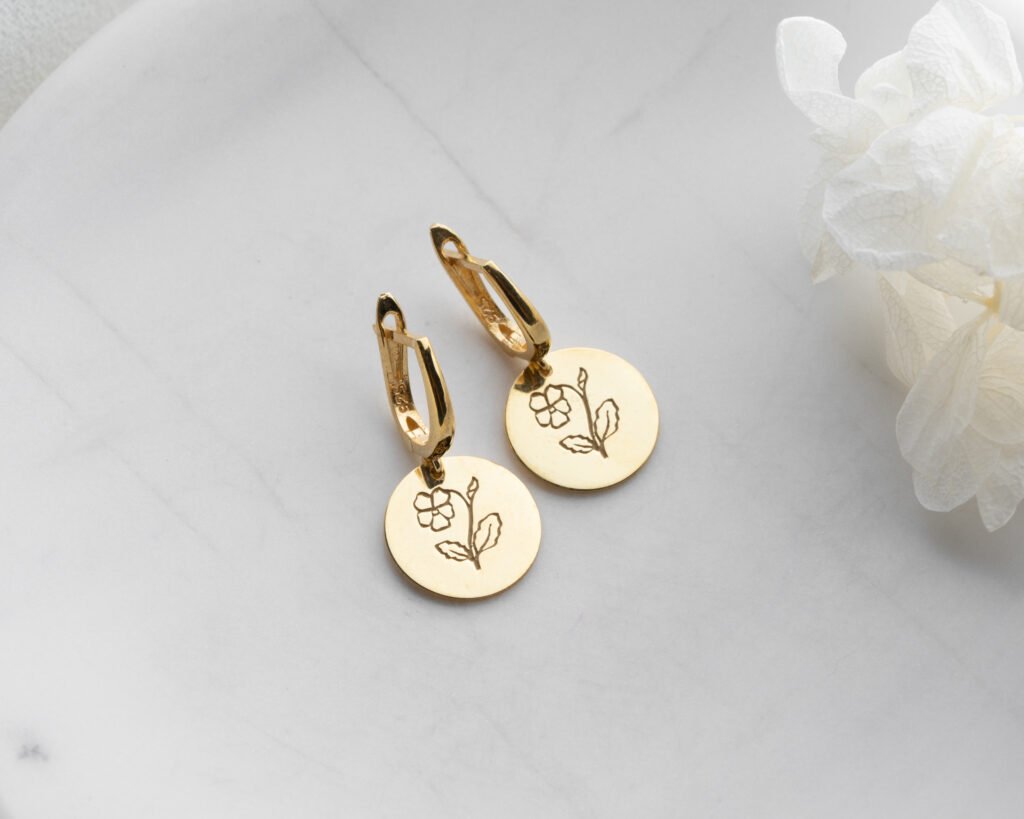 Gold engraved flower hoop earrings