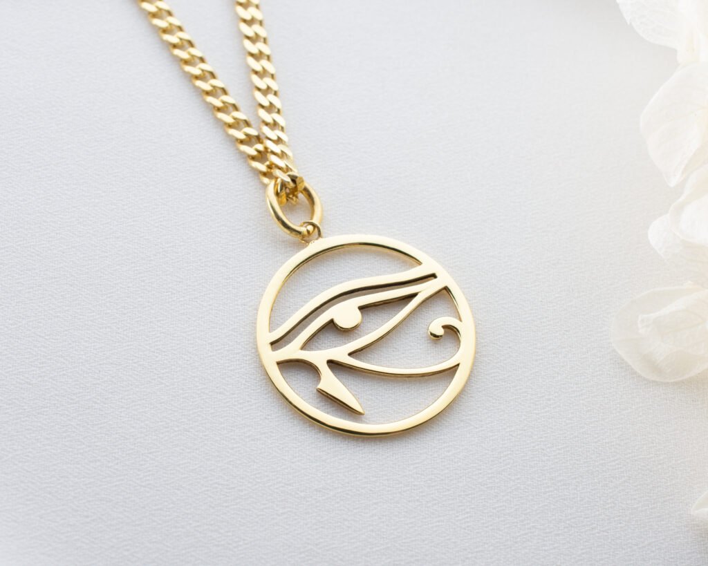 gold eye of horus pendant