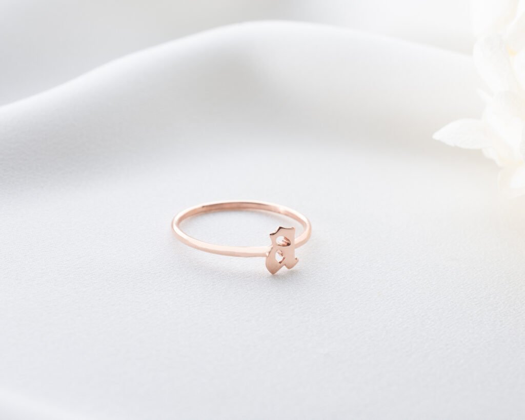 silver blue-stone ring on warm textured background