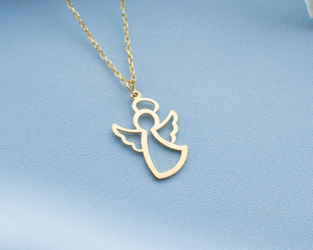 gold angel silhouette pendant