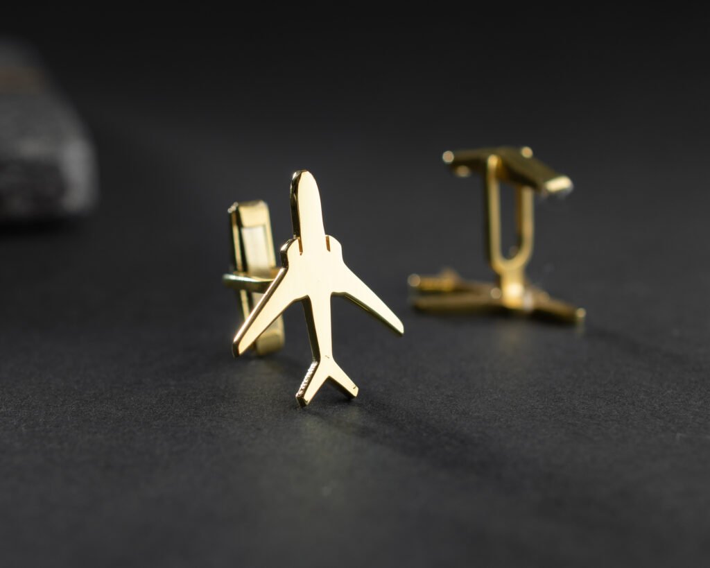 Men's gold airplane cufflinks